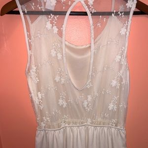 Ivory boutique dress key hole back